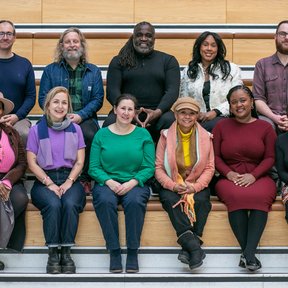 Picture of the Vi-Brent stakeholders sat on the steps in Brent Civic Centre