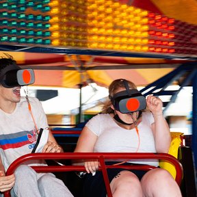 VR Twister riders at Brighton Pier