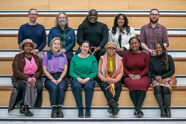 Picture of the Vi-Brent stakeholders sat on the steps in Brent Civic Centre